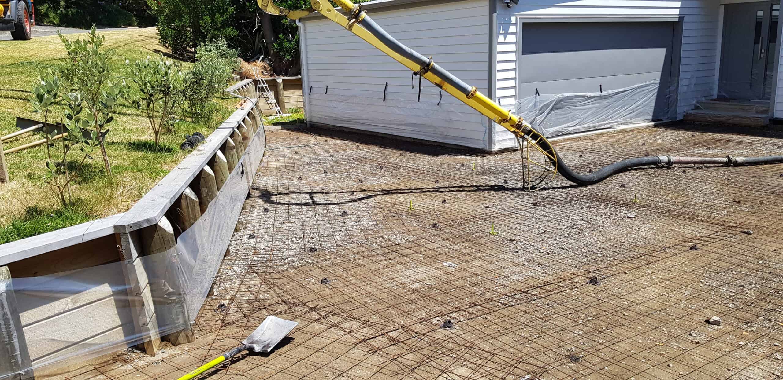 Before and after concrete driveway renovation in Paraparaumu