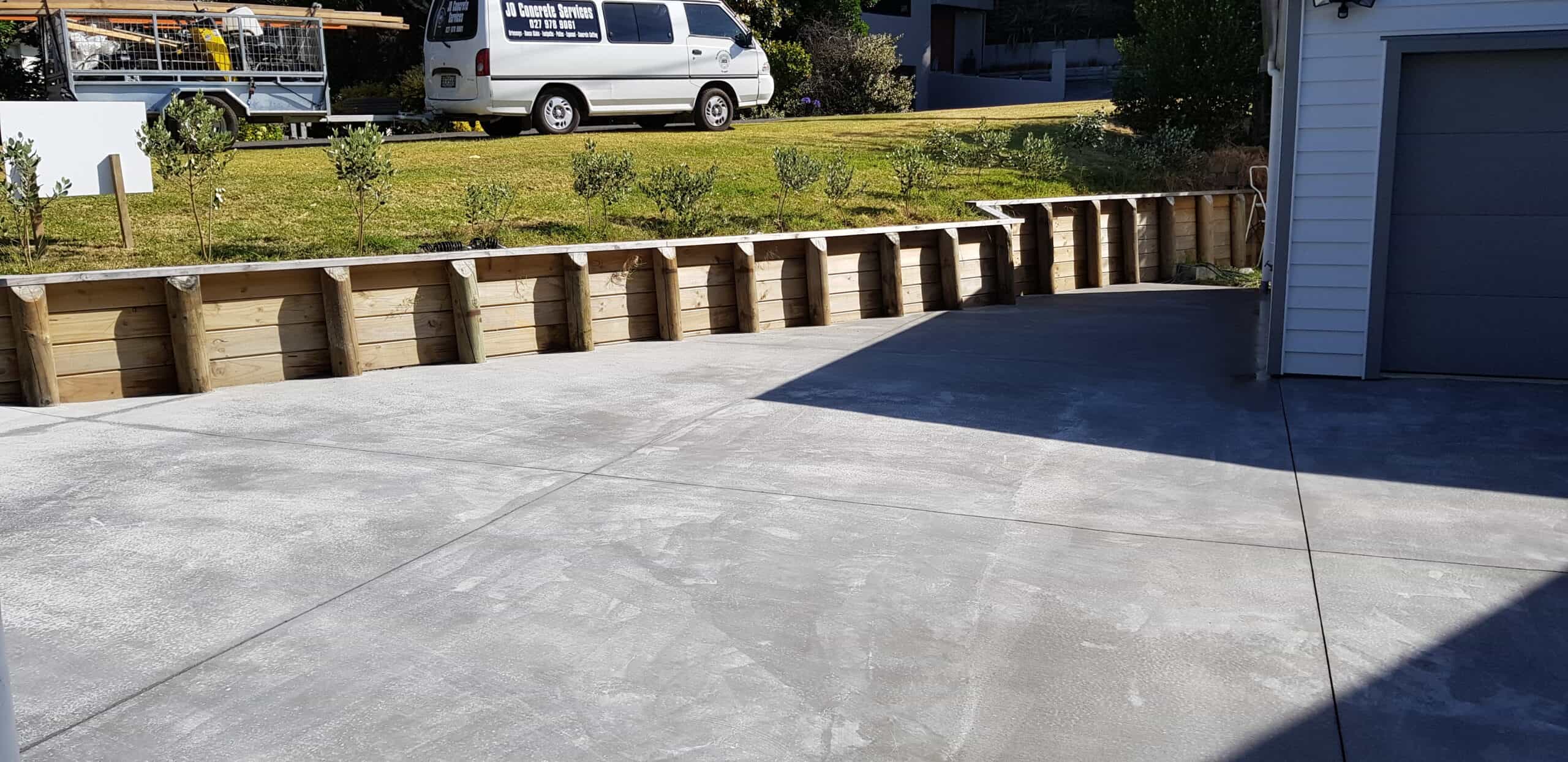 Before and after concrete driveway renovation in Paraparaumu